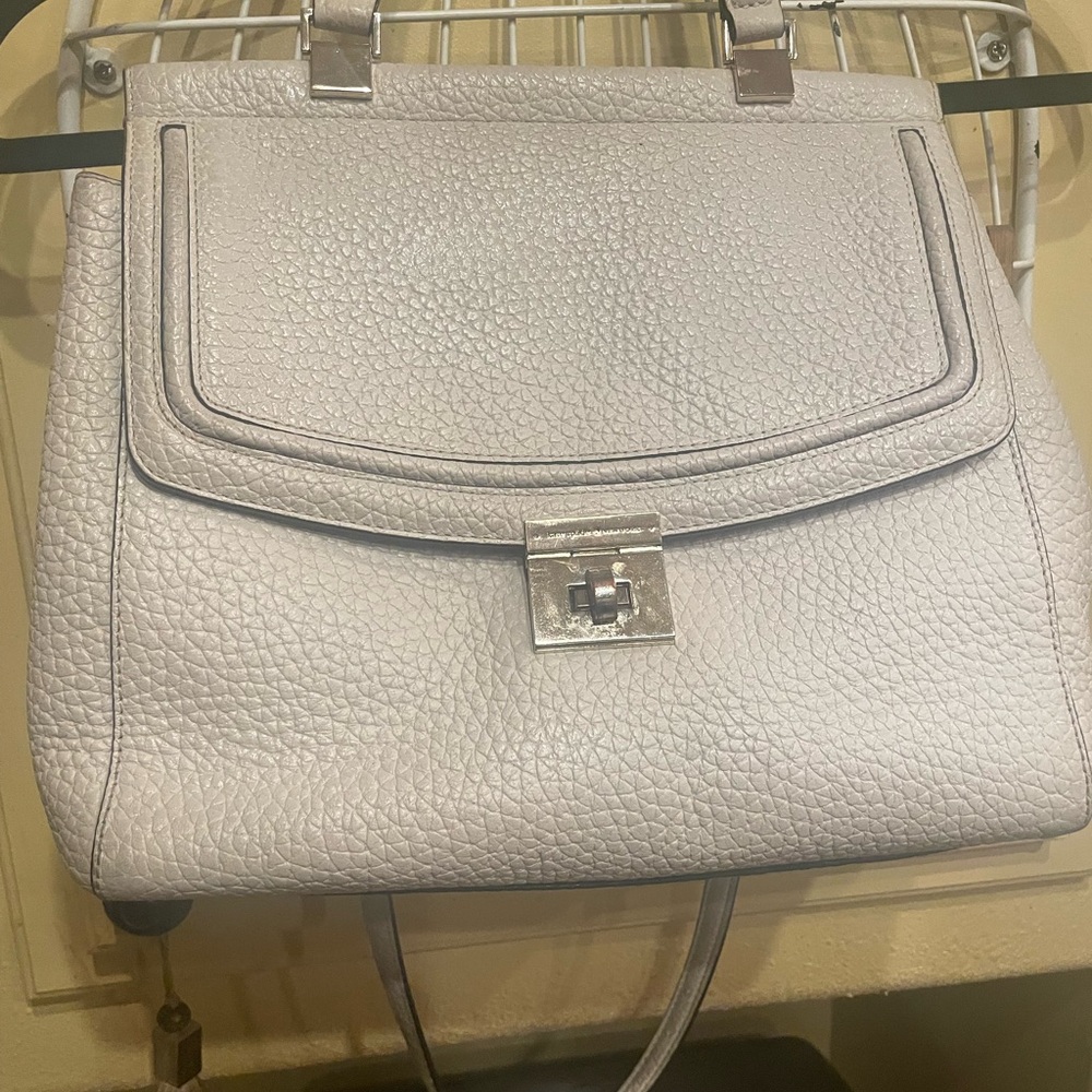Kate spade Elegant off White Leather Handbag with cream color signature lining.